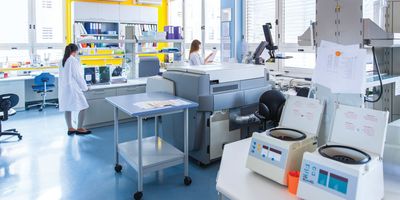 Hematology laboratory with centrifuges and work benches